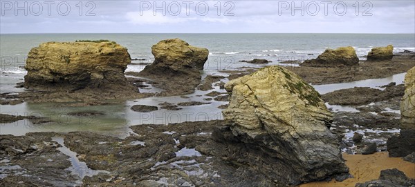 Sea stacks at the Plage des Cinq Pineaux at Saint-Hilaire-de-Riez, La Vendée, Pays de la Loire, France, Europe