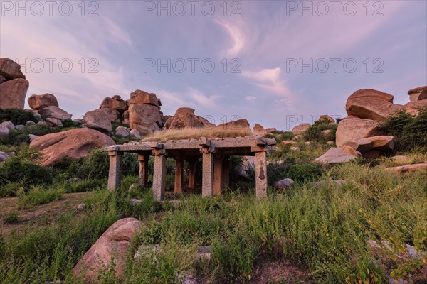 Ancient ruins in Hampi on sunset. Above Hampi Bazaar, Hampi, Karnataka, India, Asia