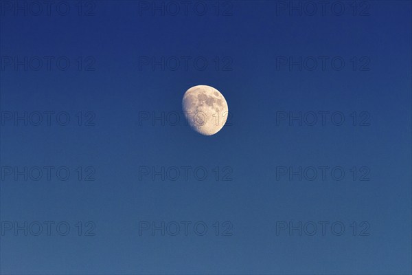 Waxing moon, blue sky, France, Europe