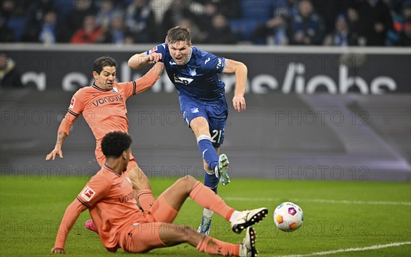 Goal kick Action Goal chance Marius Bülter TSG 1899 Hoffenheim (21) v Christian Gamboa VfL Bochum BOC (02) Bernardo VfL Bochum BOC (05) on the ground, PreZero Arena, Sinsheim, Baden-Württemberg, Germany, Europe