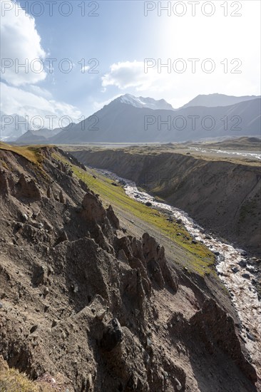 Valley with river Achik Tash between high mountains, mountain landscape with peak Pik Lenin, Osh province, Kyrgyzstan, Asia