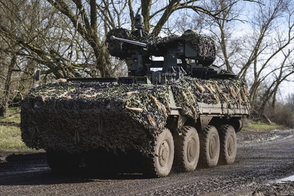 A Pandur wheeled armoured vehicle of the Czech army, photographed as part of the military exercise 'Wettiner Schwert' near Tangermünde, 26.03.2024. 'Wettiner Schwert' is part of the Quadriga exercise of the German Armed Forces and the NATO large-scale manoeuvre Steadtfast Defender 2024