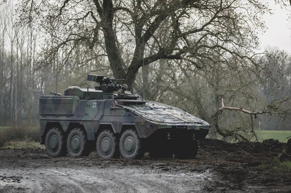 An armoured transport vehicle (called Boxer) of the German Armed Forces photographed during the military exercise 'Wettiner Schwert' near Tangermünde, 26.03.2024. 'Wettiner Schwert' is part of the Quadriga exercise of the German Armed Forces and the NATO large-scale manoeuvre Steadtfast Defender 2024