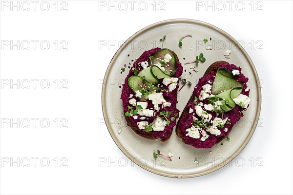 Sandwiches with beetroot hummus, cucumber and blue cheese, microgreens, rye bread, breakfast, homemade, no people