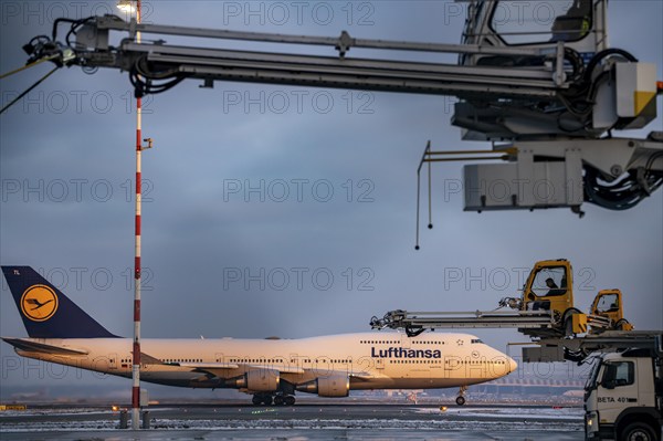 Winter at Frankfurt Main Airport, FRA, de-icing vehicles waiting for aircraft to be de-iced, Hesse, Germany, Europe