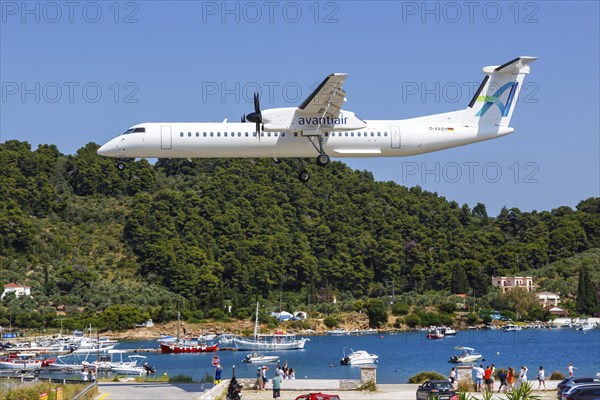 A De Havilland Dash 8 Q400 aircraft of Avanti Air with the registration D-AASH at Skiathos Airport, Greece, Europe