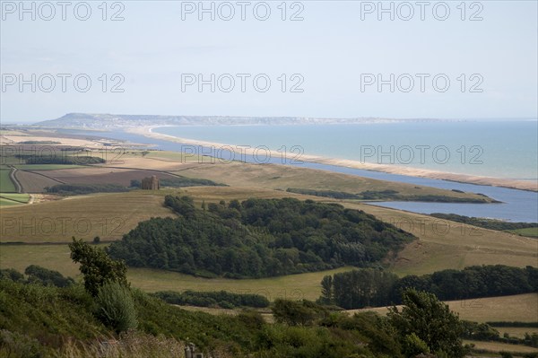 View west along Chesil beach tombolo from Abbotsbury to the Isle Portland, Dorset, England, UK