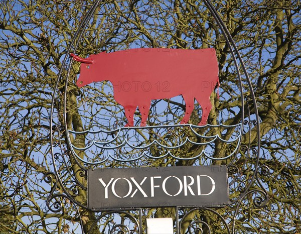 Red bull village sign Yoxford, Suffolk, England, United Kingdom, Europe