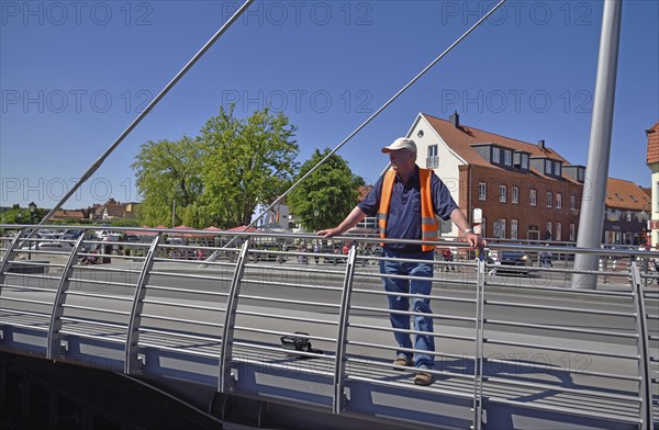 Europe, Germany, Mecklenburg-Western Pomerania, island town of Malchow, Lake Malchow, at the swing bridge, bridge keeper, Malchow, Mecklenburg-Western Pomerania, Germany, Europe