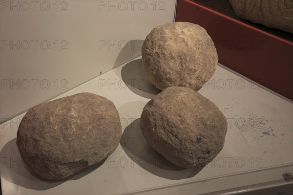 Rounded stones used for moving megaliths, National Museum of Archaeology, Valletta, Malta, Europe