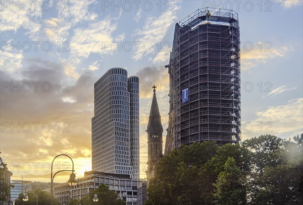 Scaffolding at the Kaiser-Wilhelm-Gedächtniskirche, Zoofenster Berlin with building Upper West with sunset. Berlin, Germany, Europe