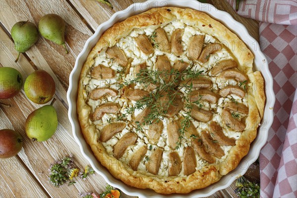 Tart with Gaishirtle and sheep's cheese, Stuttgarter Gaishirtle, pear variety, fruit, table decoration, thyme, baking, typical Swabian, Swabian cuisine, traditional cuisine reinterpreted, vegetarian, food photography, studio, Germany, Europe