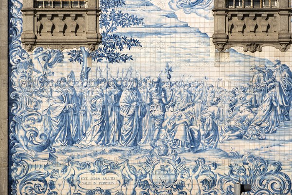 A detailed view of the exquisite blue and white azulejos tiles adorning the walls of Igreja do Carmo Church in Porto, Portugal, Europe