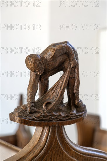 Carved wooden finial figure of fisherman c 1930s by Captain Jackson, Westleton church, Suffolk, England, Uk