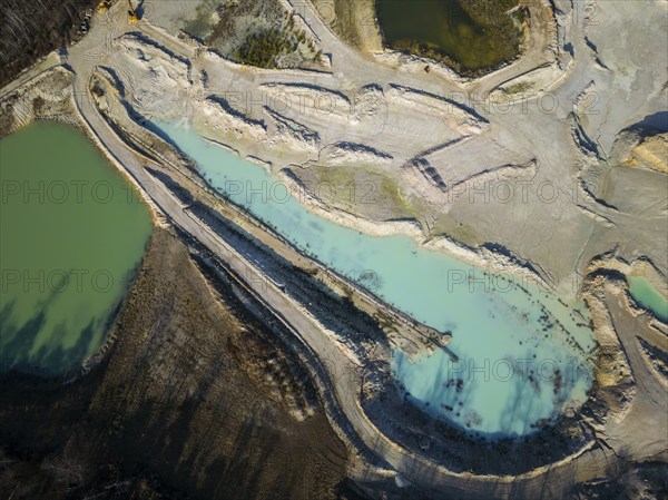 The Blue Hole, a residual hole from the kaolin mining operations of Kaolin- und Tonwerke Seilitz-Löthain GmbH, is now a natural paradise, but can only be entered by anglers, Ockrilla, Saxony, Germany, Europe