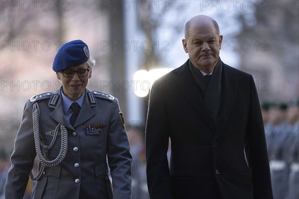 (R-L) Olaf Scholz, Federal Chancellor, and Colonel Dr Sonja fisherman, Head of Protocol at the Grand Tattoo, in Berlin, 13 March 2024