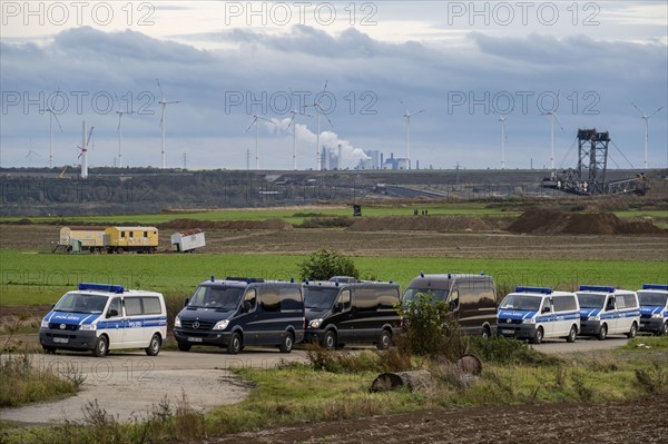 Police deployment at the protest action against the demolition of the village of Lützerath in the Rhenish lignite mining area, which is to make way for the expansion of the Garzweiler II open-cast mine, several thousand participants at the demonstration in Lützerath, North Rhine-Westphalia, Germany, Europe