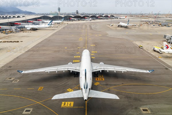 A Cathay Pacific Airbus A330-300 aircraft with registration B-HLP at Chek Lap Kok Airport (HKG) in Hong Kong, China, Asia