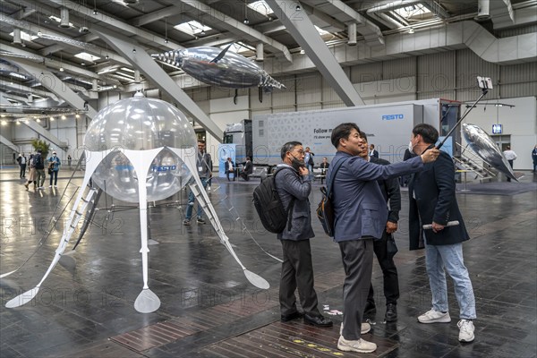 Mechanical flying objects, filled with helium, controlled by fine mechanics, movements copied from animals, birds, fish, bionics applied, to illustrate technical processes, by automation specialists Festo, at the Hannover Messe, Lower Saxony, Germany, Europe