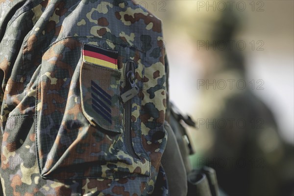 Insignia and rank on the uniform of a Bundeswehr soldier, taken during the military exercise 'Wettiner Schwert' near Tangermünde, 26.03.2024. 'Wettiner Schwert' is part of the Quadriga exercise of the Bundeswehr and the NATO large-scale manoeuvre Steadtfast Defender 2024