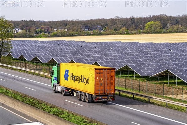 Solar park near Neukirchen-Vluyn, along the A40 motorway, over 10, 000 solar modules spread over 4.2 hectares, generating 6 million kilowatt hours per year, North Rhine-Westphalia, Germany, Europe