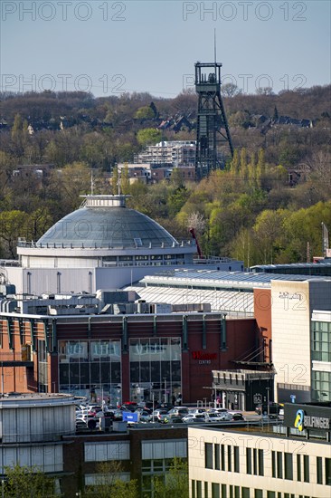 The Westfield Centro shopping centre, Neue Mitte, behind the Olga Park with the headframe of the former Osterfeld colliery, North Rhine-Westphalia, Germany, Europe