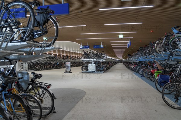 New bicycle car park at Amsterdam Central Station, IJboulevard, space for around 4000 bicycles, digitally monitored, underground, direct connection to the station, built into the water of the IJ, at the back of the station, Netherlands