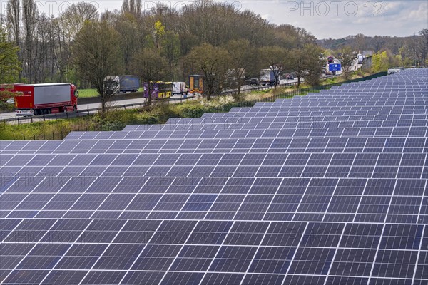 Solar park near Neukirchen-Vluyn, along the A40 motorway, over 10, 000 solar modules spread over 4.2 hectares, generating 6 million kilowatt hours per year, North Rhine-Westphalia, Germany, Europe