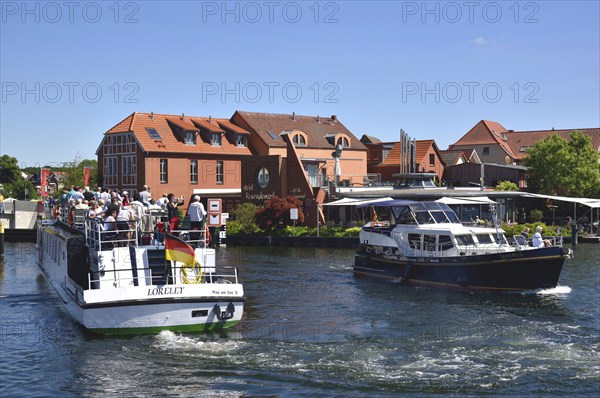 Europe, Germany, Mecklenburg-Western Pomerania, island town of Malchow, Lake Malchow, at the swing bridge, motorboats, Malchow, Mecklenburg-Western Pomerania, Germany, Europe