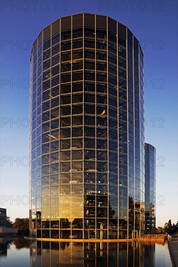 Car towers in the evening for the delivery of new cars on the grounds of the Autostadt, Volkswagen AG, Wolfsburg, Lower Saxony, Germany, Europe