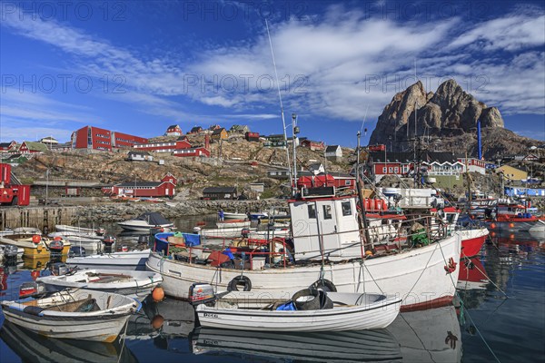 Harbour with boats and houses, Inuit settlement, Heart Mountain, summer, sunny, Uummannaq, West Greenland, Greenland, North America