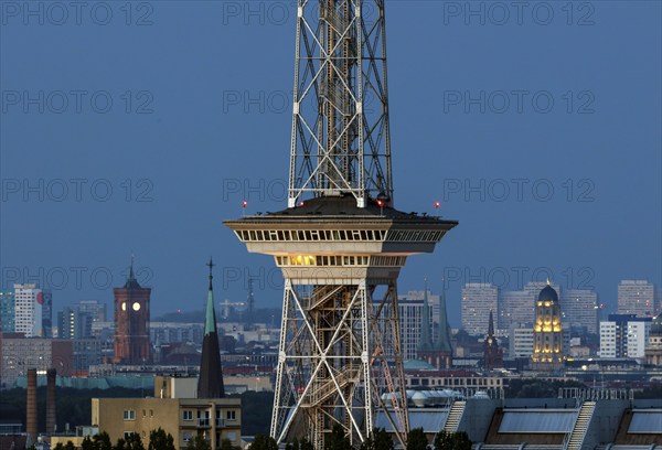 Berlin, 23.08.2022, Berlin's radio tower, the red town hall and a dome at Gendarmenmarkt are still illuminated. To save energy, many sights and public buildings are no longer to be illuminated at night