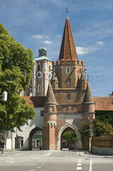 Europe, Germany, Bavaria, Ingolstadt, Kreuztor, built in 1385, part of the city fortifications, in the background the towers of the Liebfrauenmünster, Ingolstadt, Bavaria, Germany, Europe