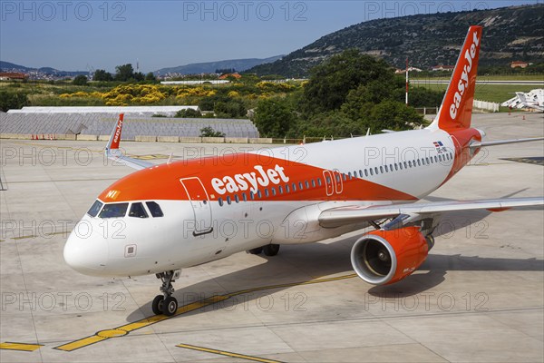 An EasyJet Airbus A320 aircraft with the registration number OE-INI at Split Airport, Croatia, Europe