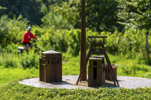 Kunstachse Burgenland, artwork by artist Nils-Udo, for the European Capital of Culture Ruhr.2010, 15 green hills, 8 of them with models made of Corten steel, of the pithead and Malakow tower of the Ewald colliery, on a 2 kilometre long path from Herten Castle Park to the Hoheward slag heap landscape, North Rhine-Westphalia, Germany, Kunstachse Burgenland, artwork by artist Nils-Udo, for the European Capital of Culture Ruhr.2010, 15 green hills, 8 of them with models made of Corten steel, of the pithead and Malakow tower of the Ewald colliery, on a 2 kilometre long path from Herten Castle Park to the Hoheward slag heap landscape, North Rhine-Westphalia, Germany, Europe