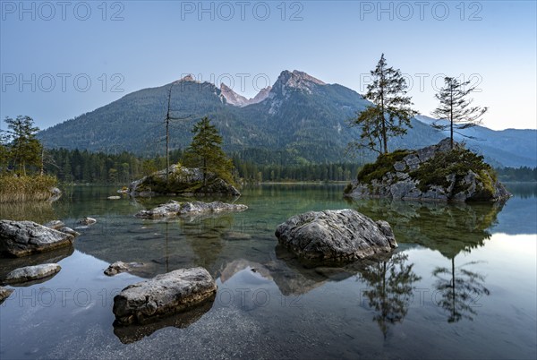 Hochkalter reflected in Hintersee, at sunset, Berchtesgaden National Park, Ramsau, Upper Bavaria, Bavaria, Germany, Europe