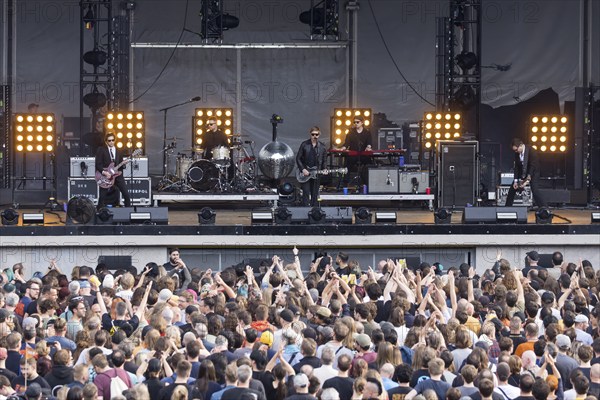 Daniel Kessler (guitarist), Samuel Sam Fogarino (drummer), Paul Banks (singer), Brandon Curtis (keyboarder) and Brad Truax (bassist) of the band Interpol live at the Parkbühne Wuhlheide in Berlin on 22 June 2024