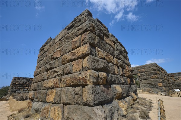 Detailed view of a corner of an ancient ruined wall in an arid landscape under a clear blue sky, Palaiokastro, Ancient Fortress, 3rd and 4th century BC, above Mandraki, Nisyros, Dodecanese, Greek Islands, Greece, Europe