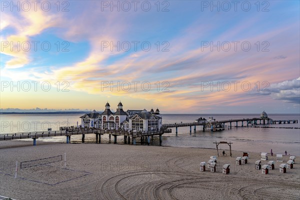 The pier of Sellin, evening mood, sunset, 394 metres long, with restaurant, jetty, beach chairs, island of Rügen, Mecklenburg-Western Pomerania, Germany, Europe