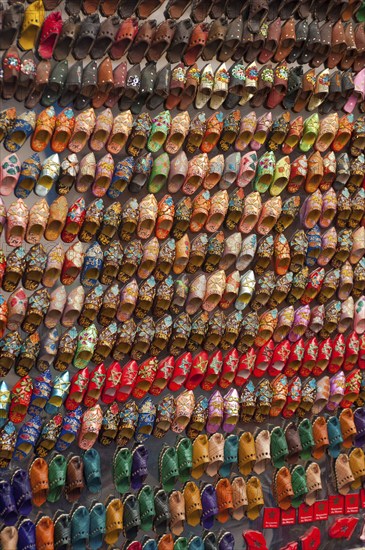 Small babouche magnets on a market, shoes, painted, trade, market, trader, bazaar, offer, colourful, handicraft, Islam, souk, medina, product presentation, display, trade, tourism, Sovenian, travel, African, Arabic, Essaouira, Morocco, Africa