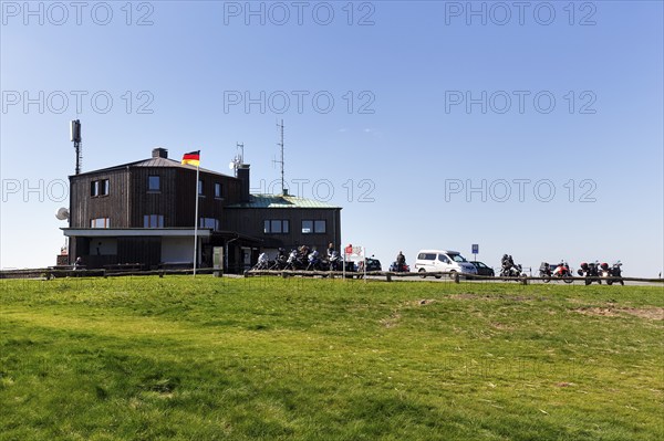 Restaurant and café, motorbikes in car park, Köterberghaus, mountain peak, sunny spring weather, Köterberg, Lügde, Weserbergland, North Rhine-Westphalia, Germany, Europe