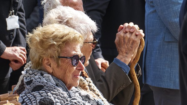 Survivors of the massacre of 3.6.1941, Elderly people sit together, one holds a walking stick at a ceremonial event, Visit of the Federal President Frank-Walter Steinmeier in Kandanos on 31 October 2024, Federal President, Frank-Walter Steinmeier, memorial, war crimes, Nazis, Wehrmacht crimes, World War II, Kandanos, Southwest Crete, Crete, Greek Islands, Greece, Europe