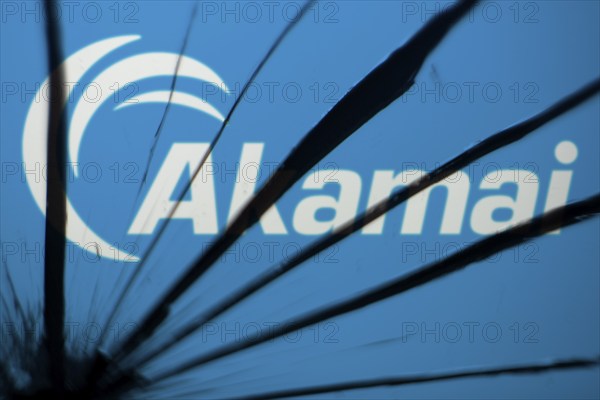 Dhaka, Bangladesh- 09 Nov 2024: Akamai logo is visible on the broken glass