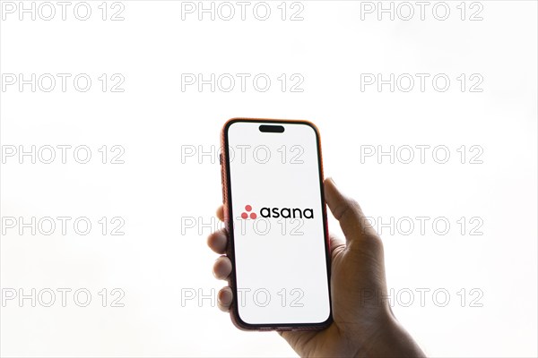 Dhaka, Bangladesh- 09 Nov 2024: Asana logo is displayed on smartphone