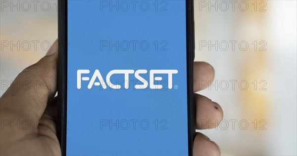 Dhaka, Bangladesh- 09 Nov 2024: Factset logo is displayed on smartphone