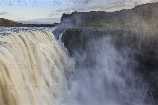 Large waterfall in a gorge, spray, rapids, summer, midnight sun, Dettifoss, North Iceland, Iceland, Europe