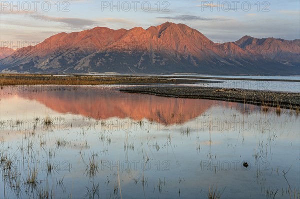 Morning light, mountains reflected in lake, autumn, wilderness, Kluane Lake, Kluane Mountains, Yukon, Canada, North America