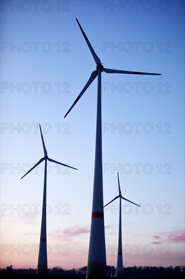 Wind turbines in front of sunrise, Wevelsburg wind farm, Büren, Paderborn plateau, North Rhine-Westphalia, Germany, Europe