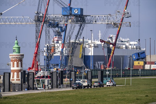 Car carrier ship, GOLIATH LEADER, at the general cargo terminal, Columbuskaje, harbour cranes, historic Pingelturm, in the seaport of Bremerhaven, Bremen, Germany, Europe