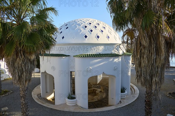 White dome-shaped structure surrounded by palm trees with decorative elements and stepped entrance, thermal springs, thermal baths, thermal baths of Kallithea, Kallithea, Rhodes, Dodecanese, Greek Islands, Greece, Europe